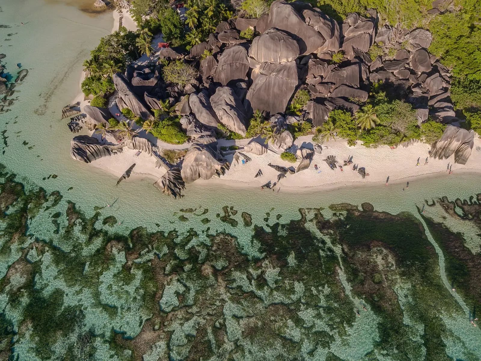 Anse Source d'Argent, La Digue, Seychelles - aerial view of the beach, granite boulders and reef shallows