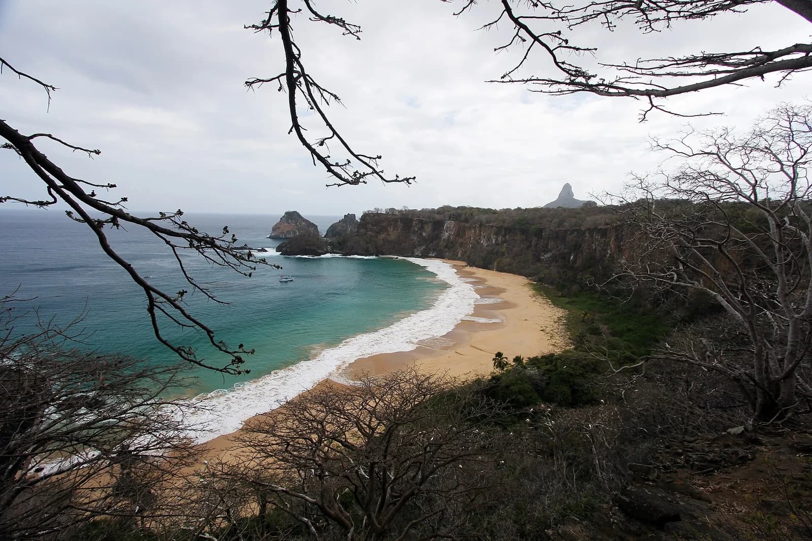 Baia do Sancho, Fernando de Noronha, Brazil - clifftop view over the beach with Morro do Pico on the horizon