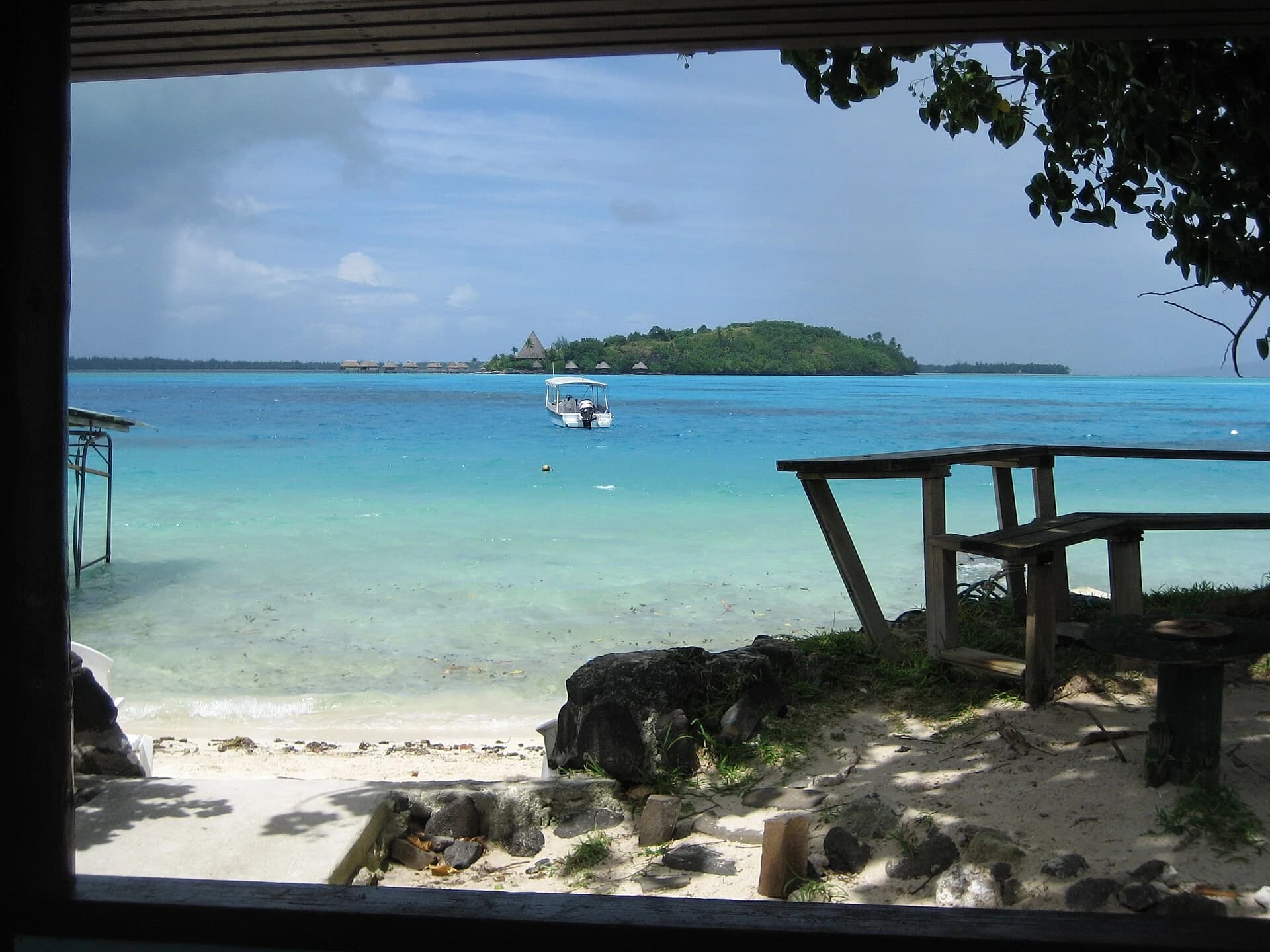 Matira Beach, Bora Bora, French Polynesia - white sand and clear turquoise shallows facing the lagoon