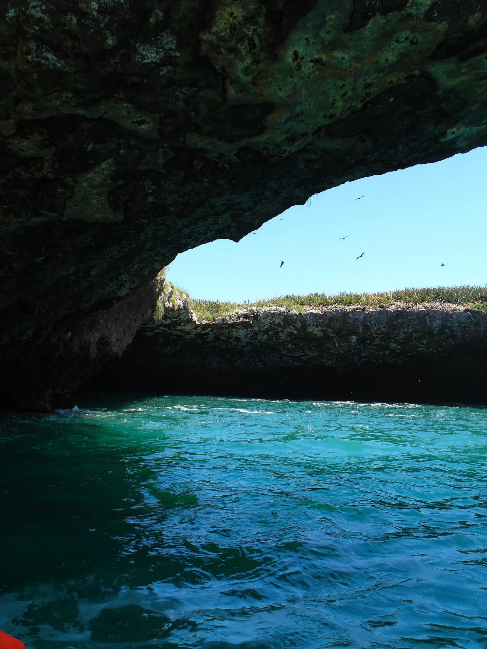 Playa del Amor (Hidden Beach), Marieta Islands, Mexico - natural rock arch framing the turquoise water at the entrance to the crater cove