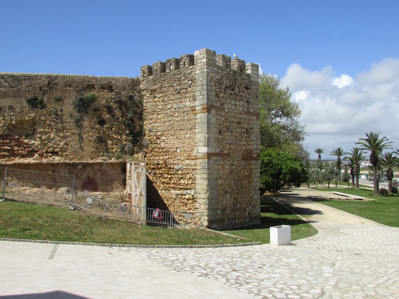 A stone tower on the old city walls of Lagos, at the edge of the historic centre