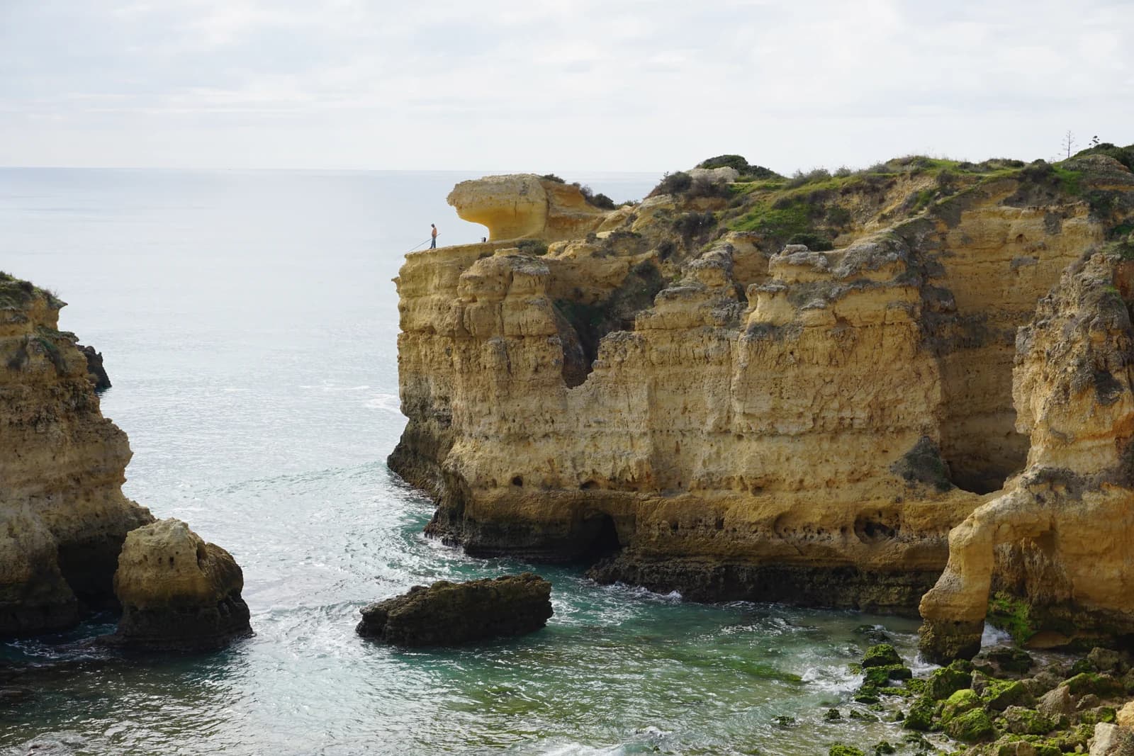 Ochre cliffs and rocks at Praia de São Rafael, west of Albufeira