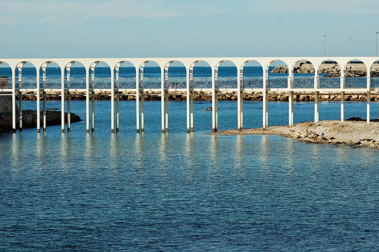 Il Pirgo, the arcaded pier on the Civitavecchia seafront promenade near the town's cheapest hotels