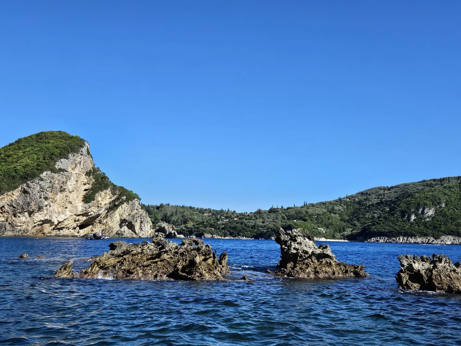 Limestone cliffs and rocks in Liapades Bay on the Paleokastritsa coast of north-west Corfu