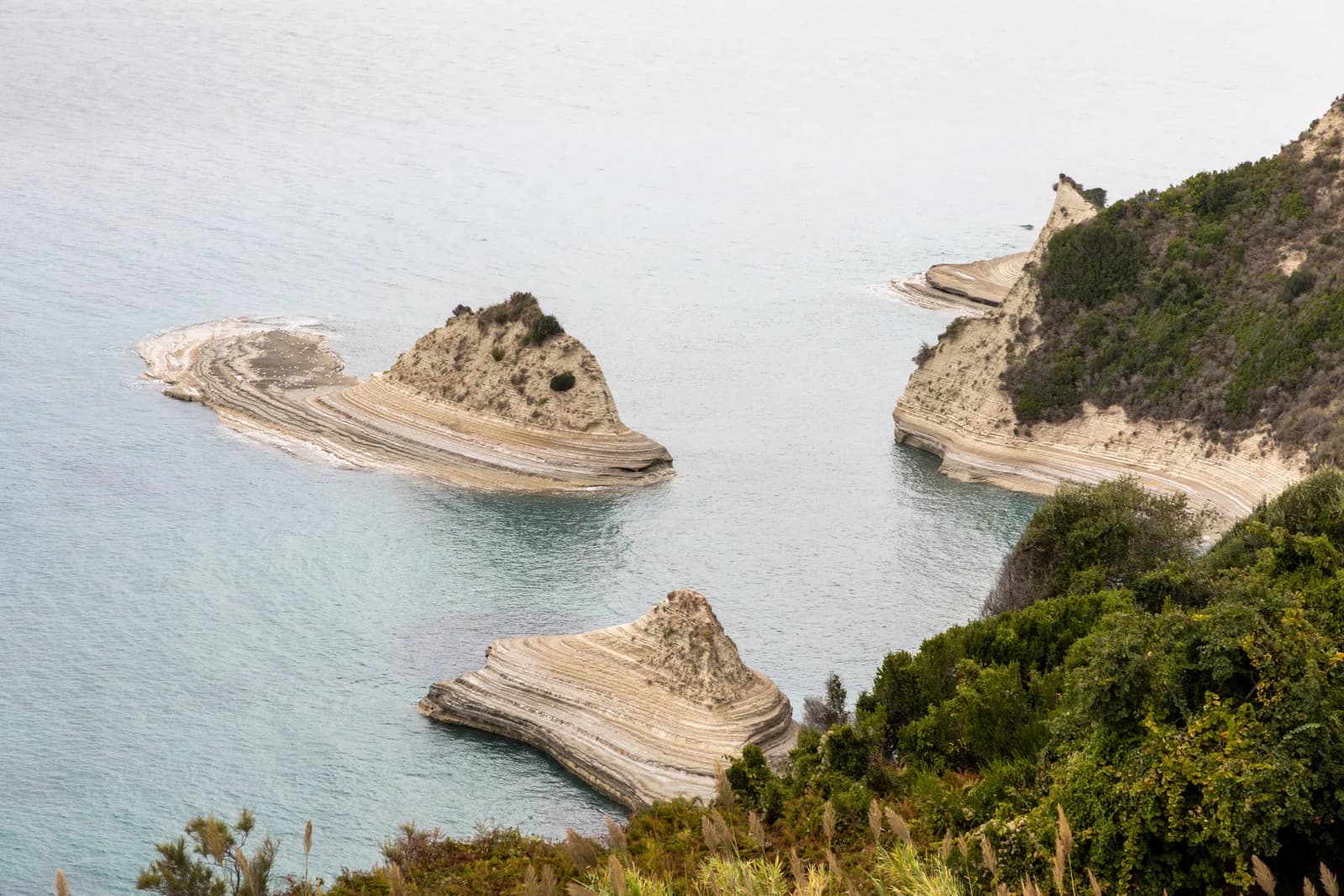The layered pale headlands of Cape Drastis near Peroulades, on the north-west tip of Corfu