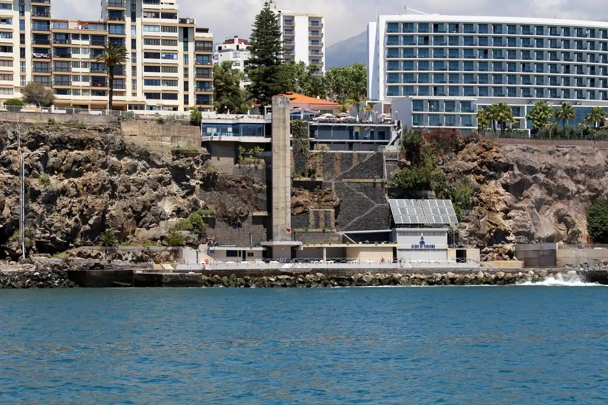 Funchal's western hotel strip along the Estrada Monumental, seen from the water