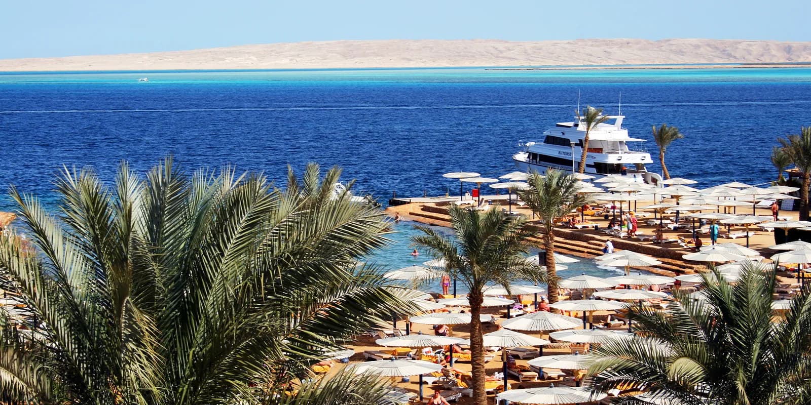 A hotel beach with a small marina on the Hurghada town shoreline