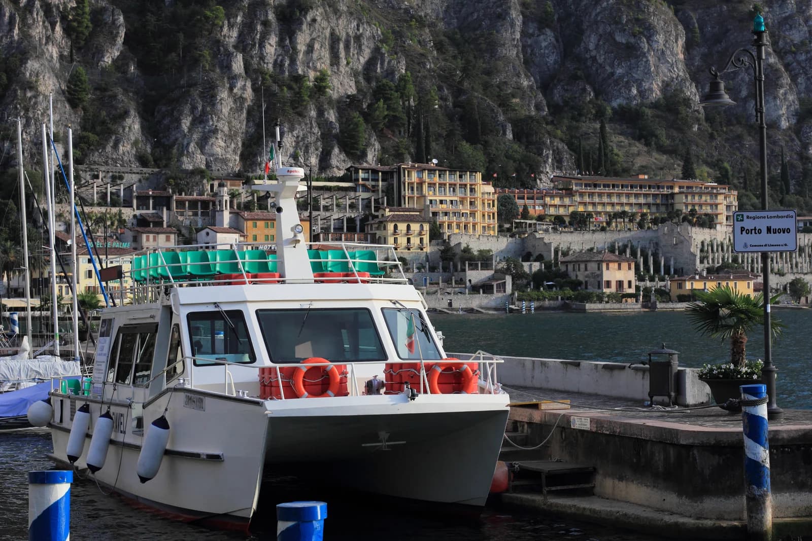 Porto Nuovo in Limone sul Garda, with the village and its terraces climbing the cliff behind