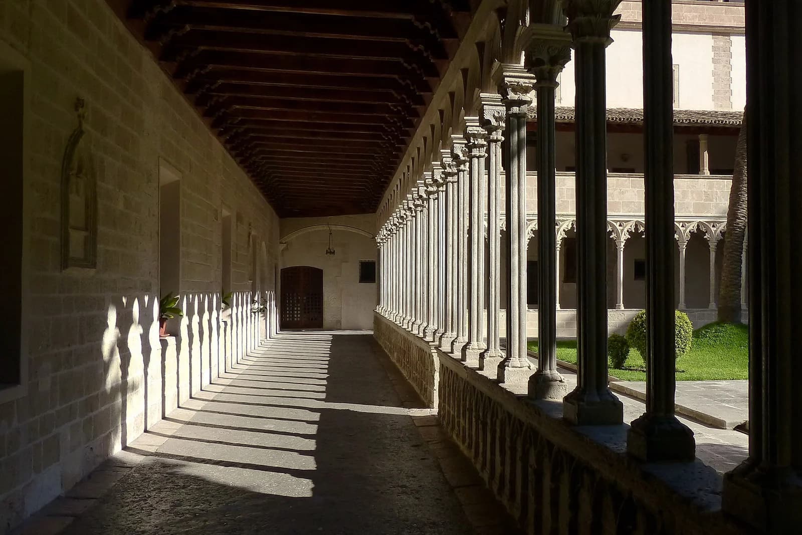 The Gothic cloister of the Basilica de Sant Francesc in Palma old town, on the square that gives the neighbouring hotel its name