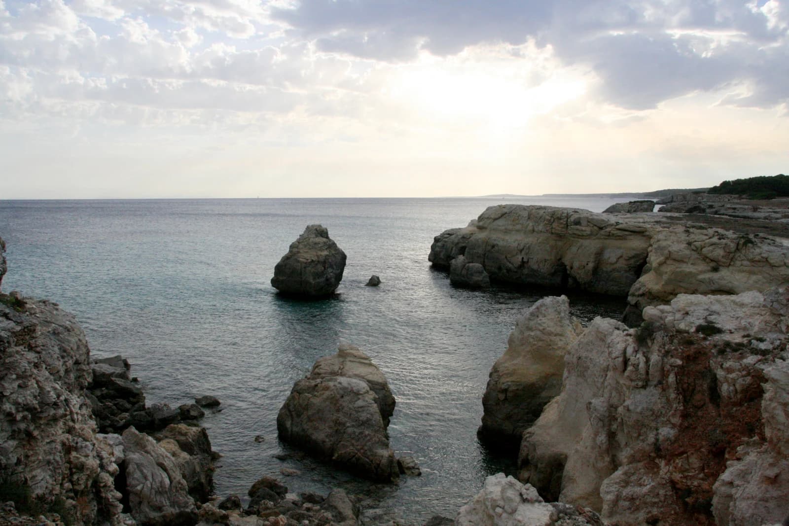 Rocks and clear water at Es Raco des Cavall on the south coast of Es Migjorn Gran