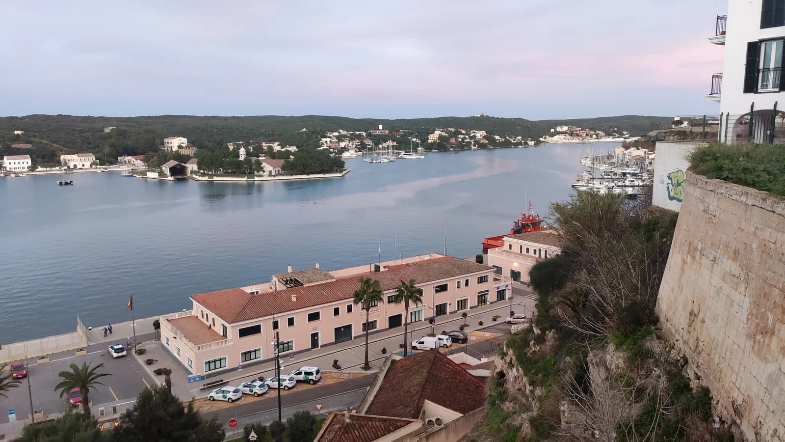The harbour of Mahon seen from the cliff edge of the old town, a few minutes' walk below its town-house hotels
