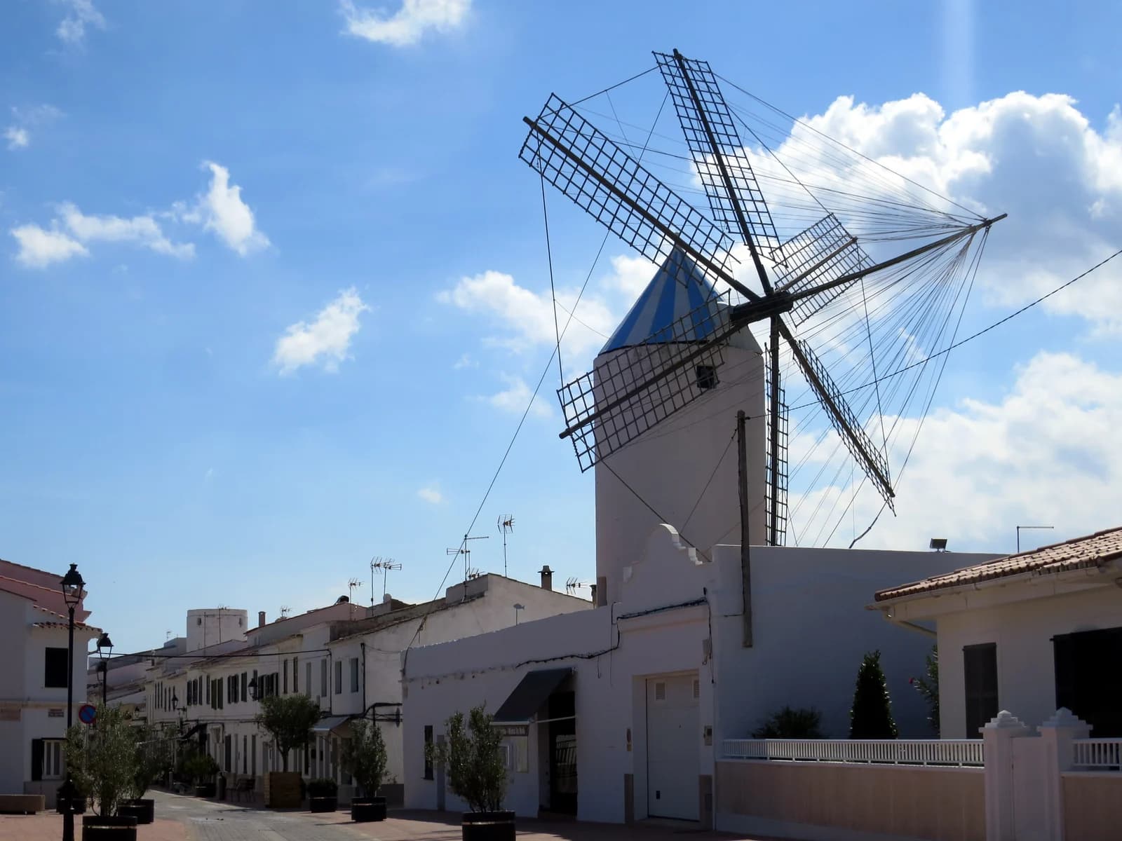The white windmill on the main street of Sant Lluis, the village on whose outskirts the rural boutique hotels of south-east Menorca sit