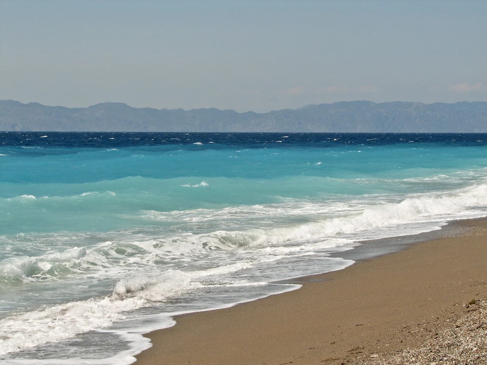 Wind-driven waves breaking on Ixia beach, on the exposed west coast of Rhodes near Ialysos