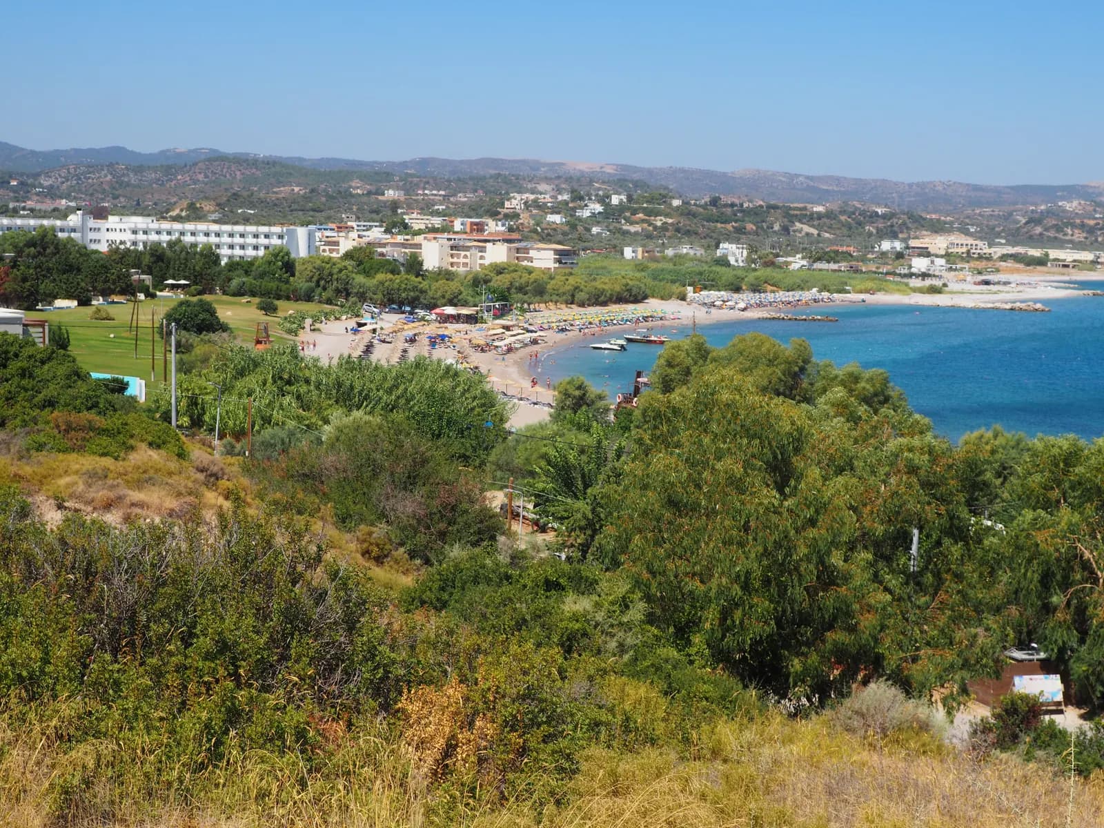 Kolymbia's bay and beach on the east coast of Rhodes, seen from the green hillside above