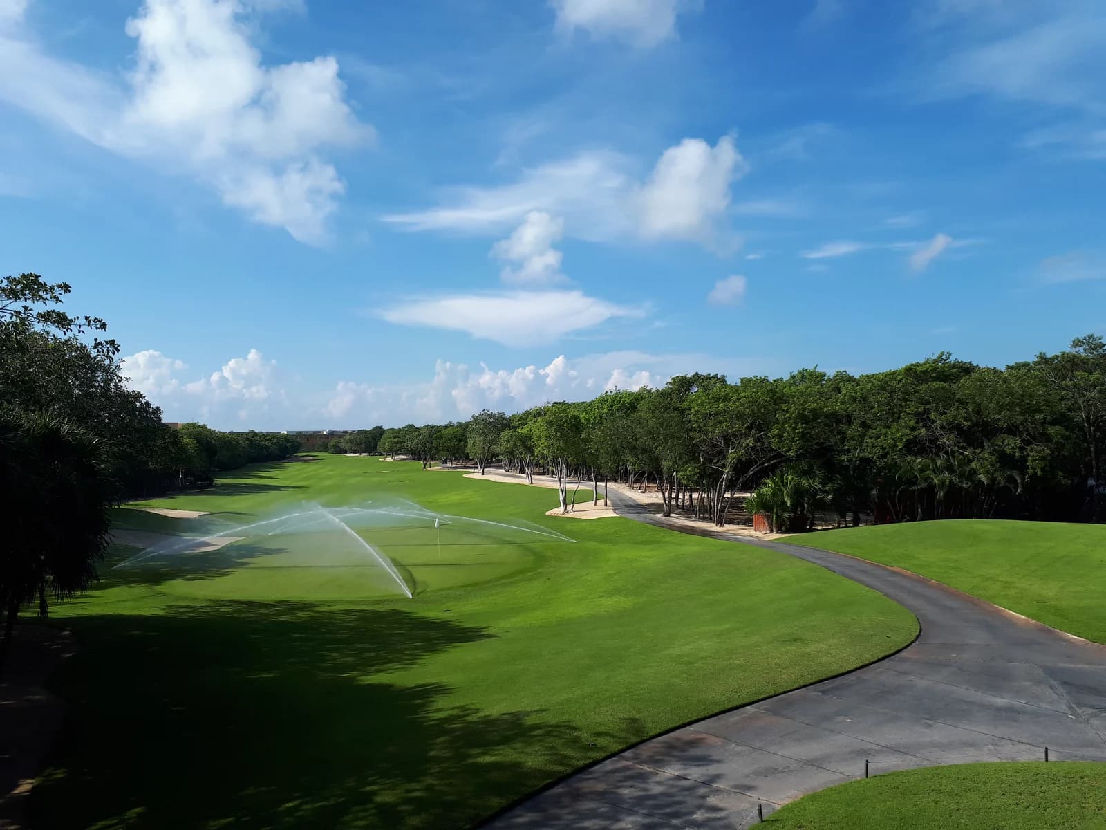 A fairway on the El Camaleon golf course at Mayakoba, edged by jungle