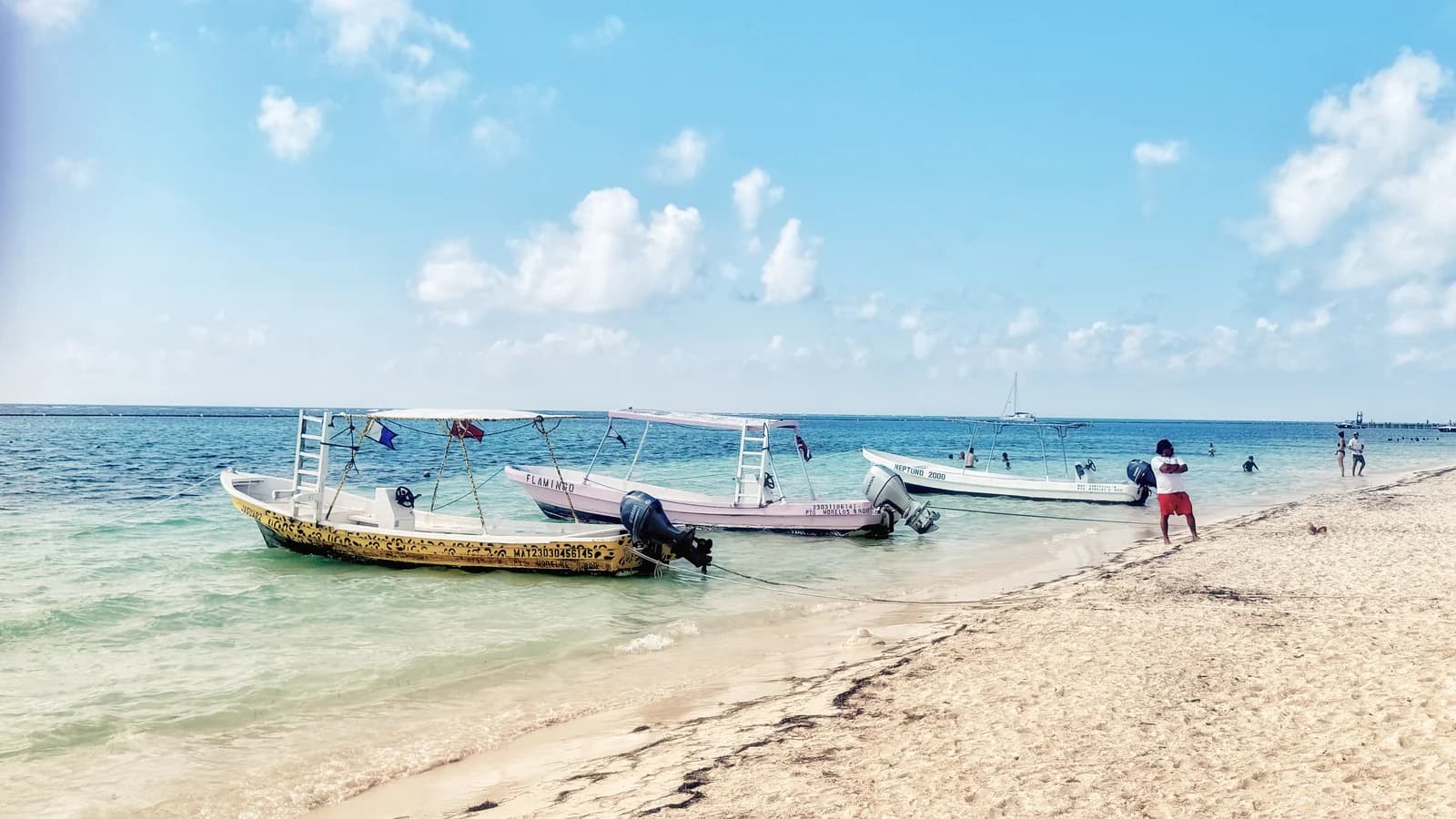 Fishing boats pulled up on the beach at Puerto Morelos, the village at the northern end of the Riviera Maya