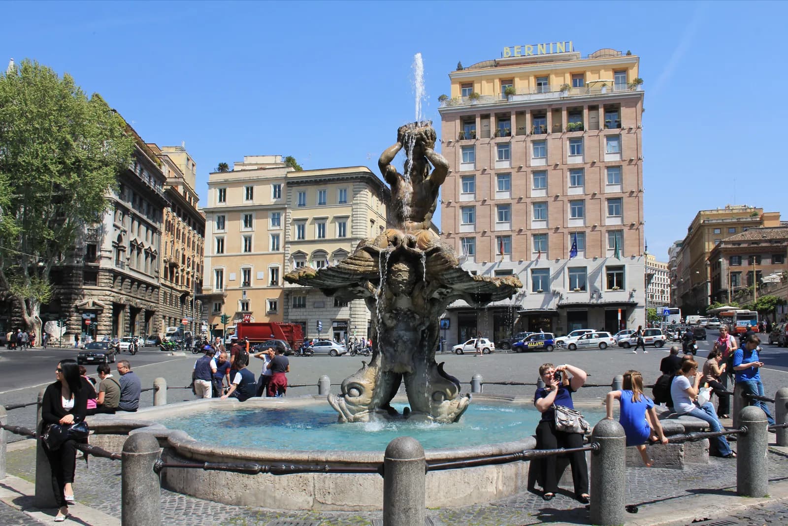 Bernini's Triton Fountain in Piazza Barberini, the square Via di San Basilio runs off