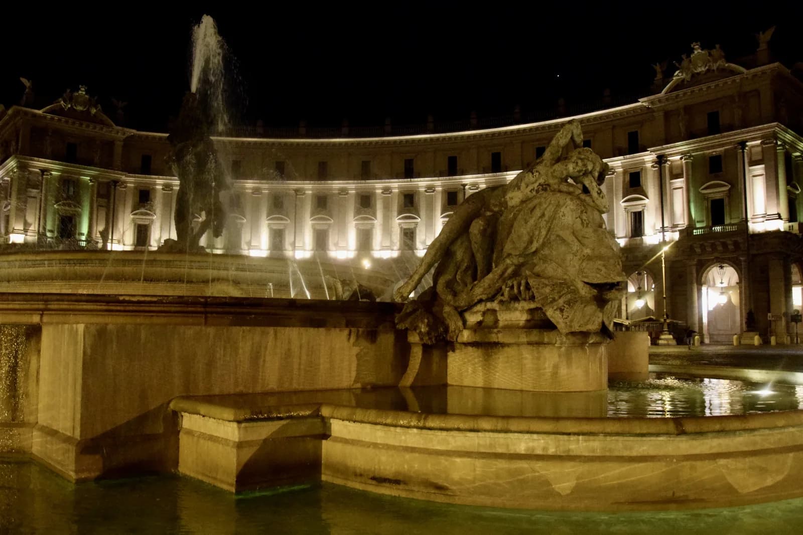 The Fountain of the Naiads lit at night in Piazza della Repubblica, the square beside Termini