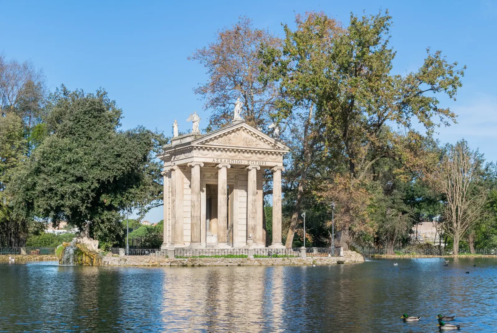 The lake and Temple of Aesculapius in the Villa Borghese gardens, the park the Pinciano hotels back onto