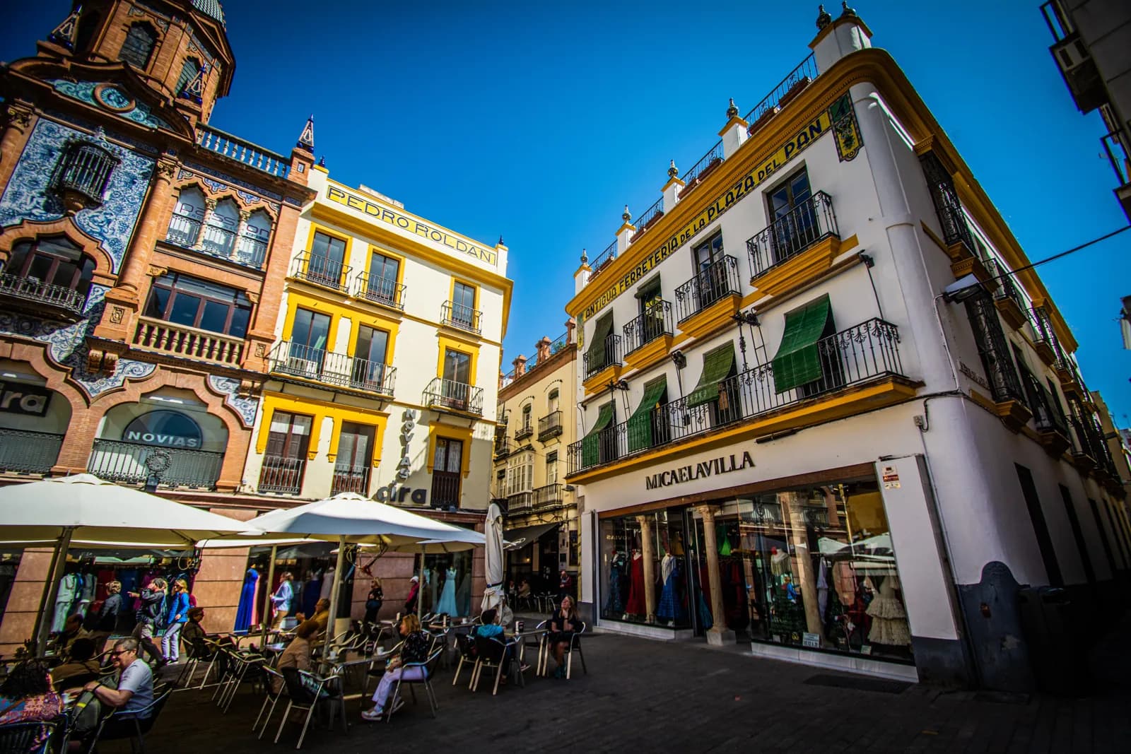 Terrace tables on a square in the Alfalfa quarter of Seville