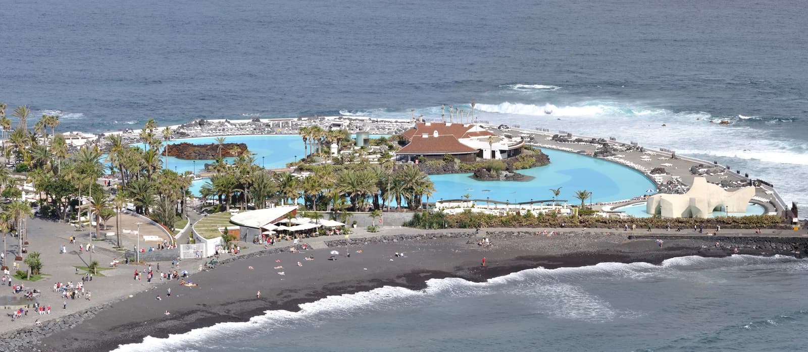 Black sand and the Lago Martiánez sea pools in Puerto de la Cruz, on Tenerife's greener north coast