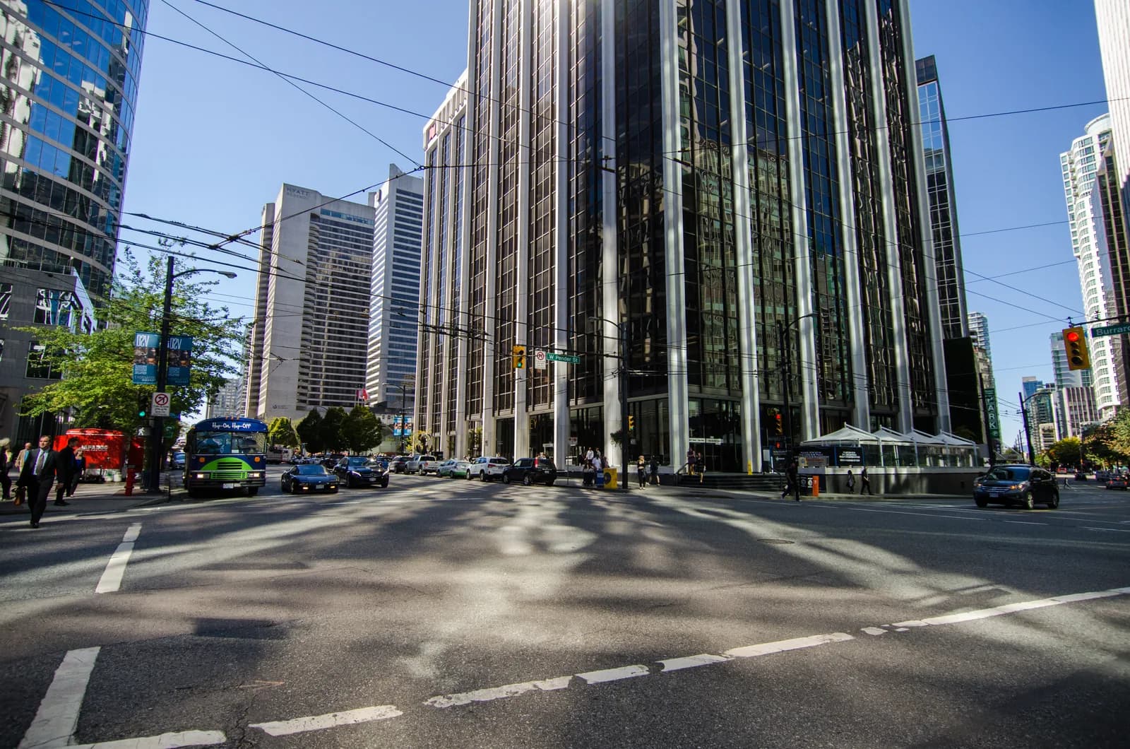 Burrard Street at West Pender in downtown Vancouver, running between glass office towers