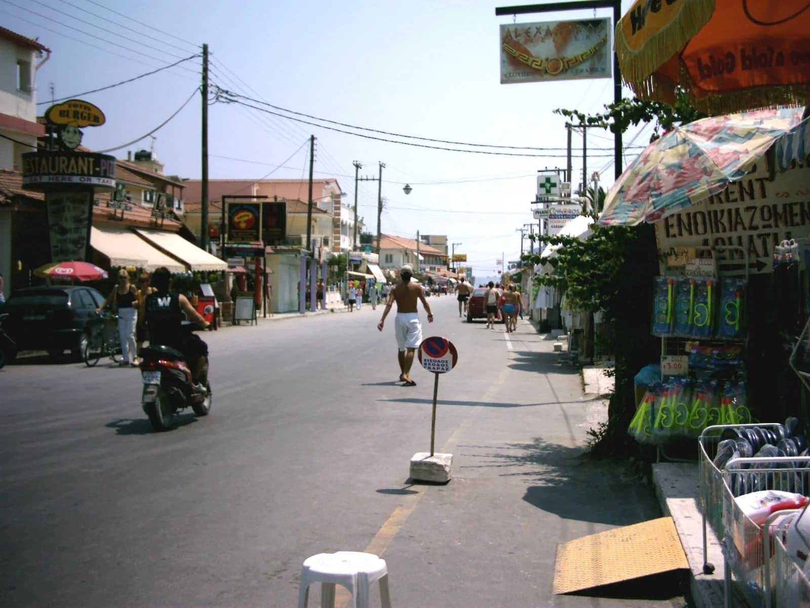 The main street of Laganas, lined with bars, shops and restaurants, on Zante's south coast