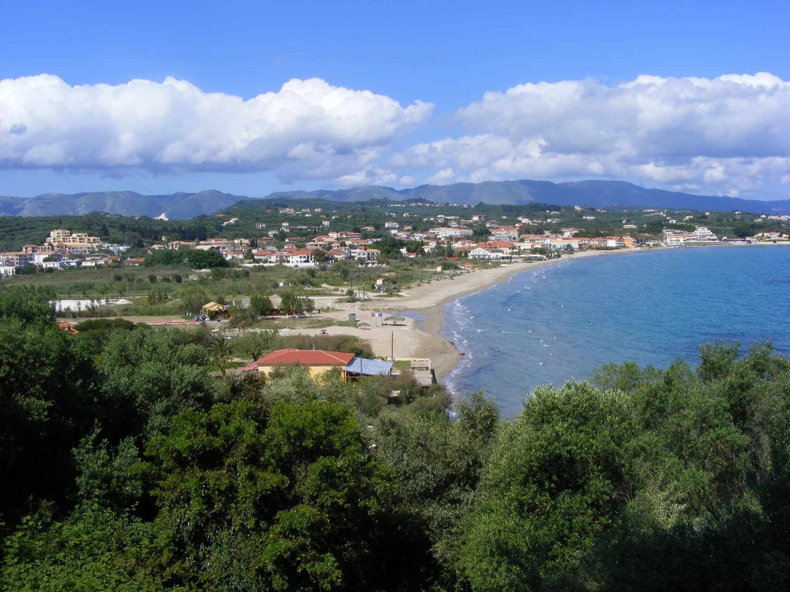 Tsilivi Bay and its sandy beach seen from the wooded hill above, the family resort area of north-east Zante