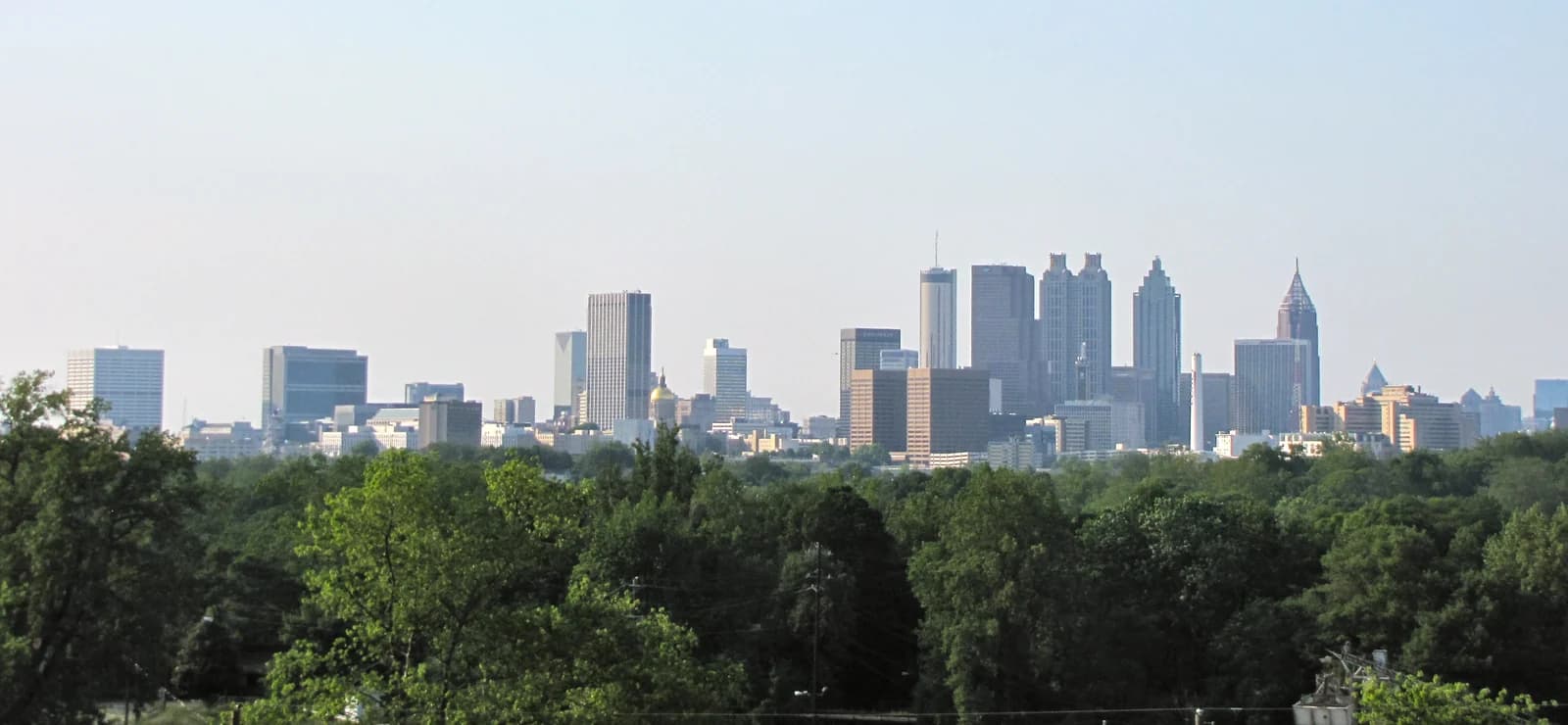 The downtown Atlanta skyline above Centennial Olympic Park and the family attractions around it