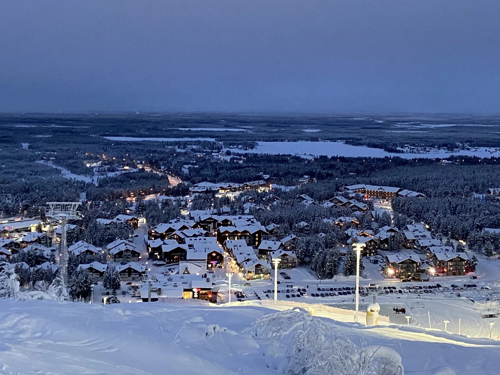 Winter twilight over the village of Sirkka below Levi fell in Kittila, Finnish Lapland