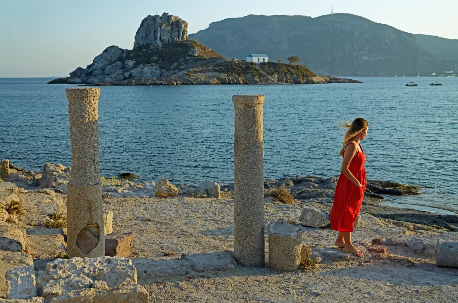 The ruins of the Agios Stefanos basilica on the Kefalos coast of Kos, with the Kastri islet and its chapel offshore