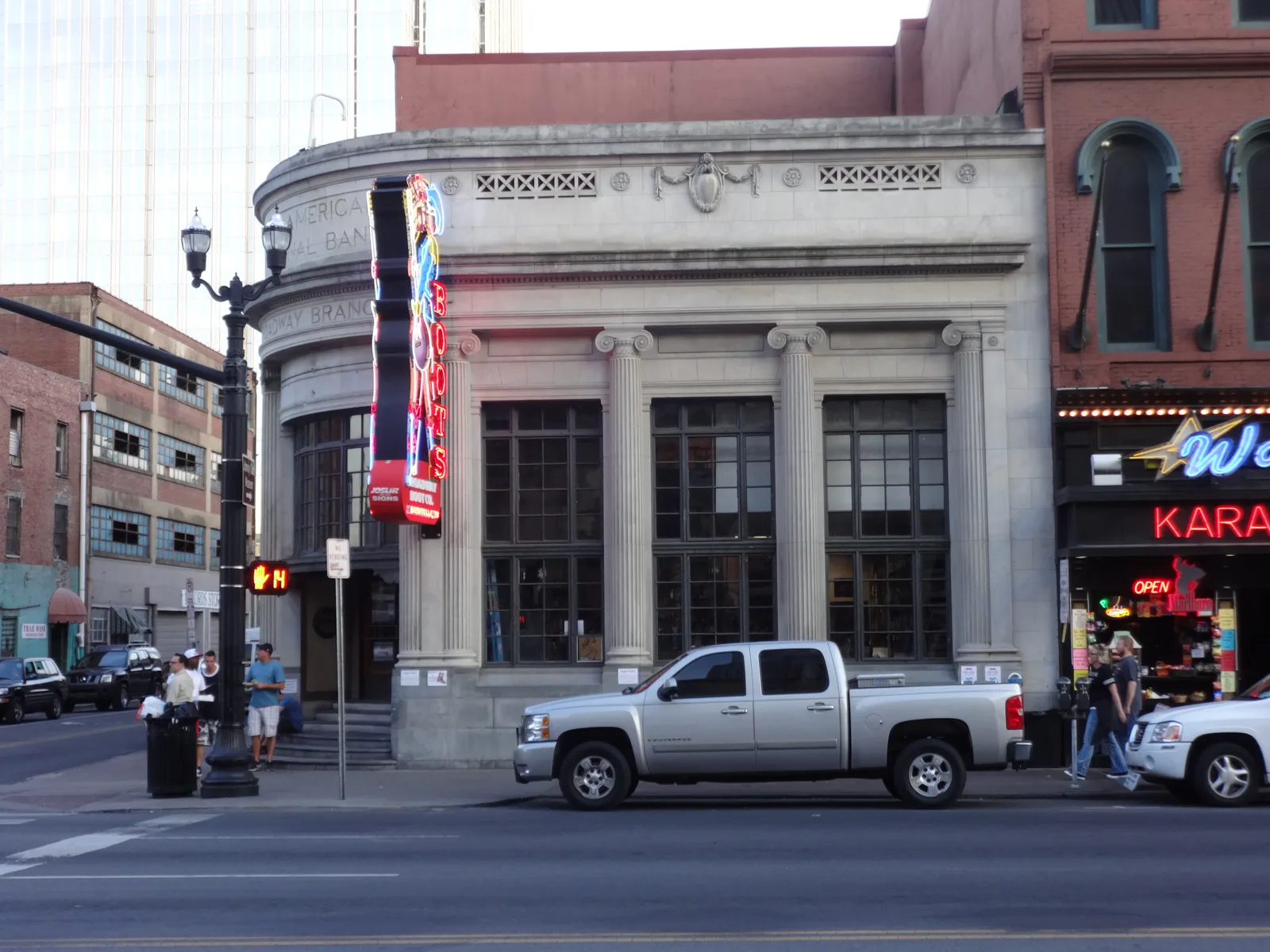 A Lower Broadway corner in Nashville, the streetscape the family hotels sit behind