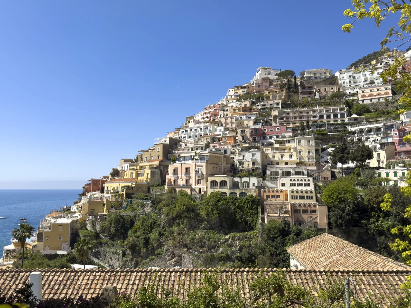 Positano stacked down its cliff above the sea, every hotel terrace on its own level
