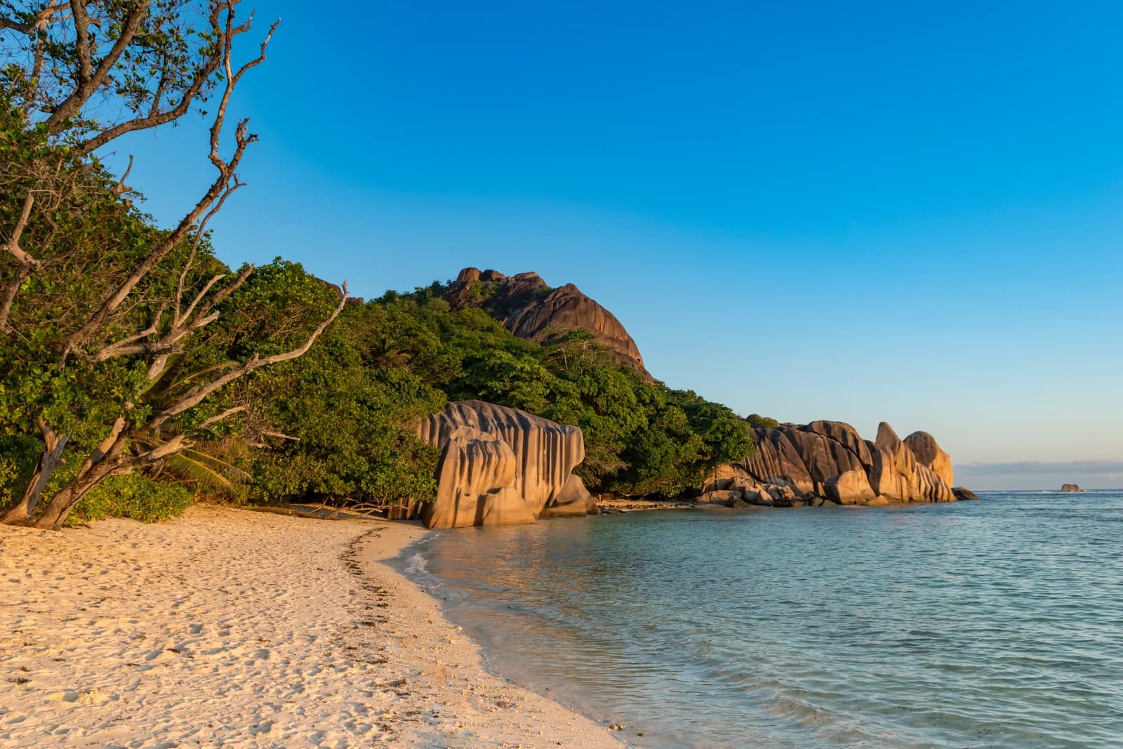 Granite boulders and shallow water at Anse Source d'Argent on La Digue, Seychelles