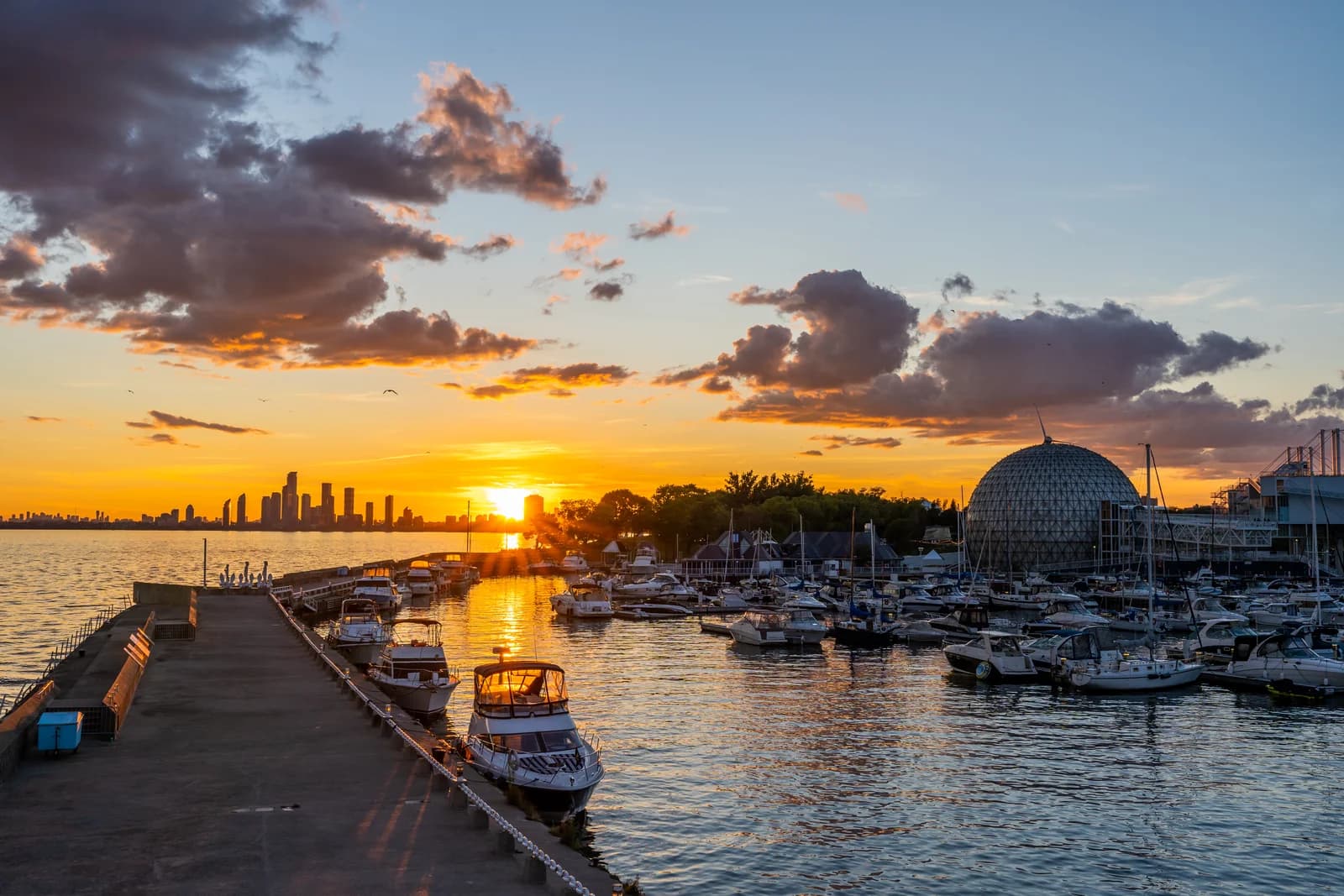 Sunset over the marina at Ontario Place, with Toronto's skyline behind