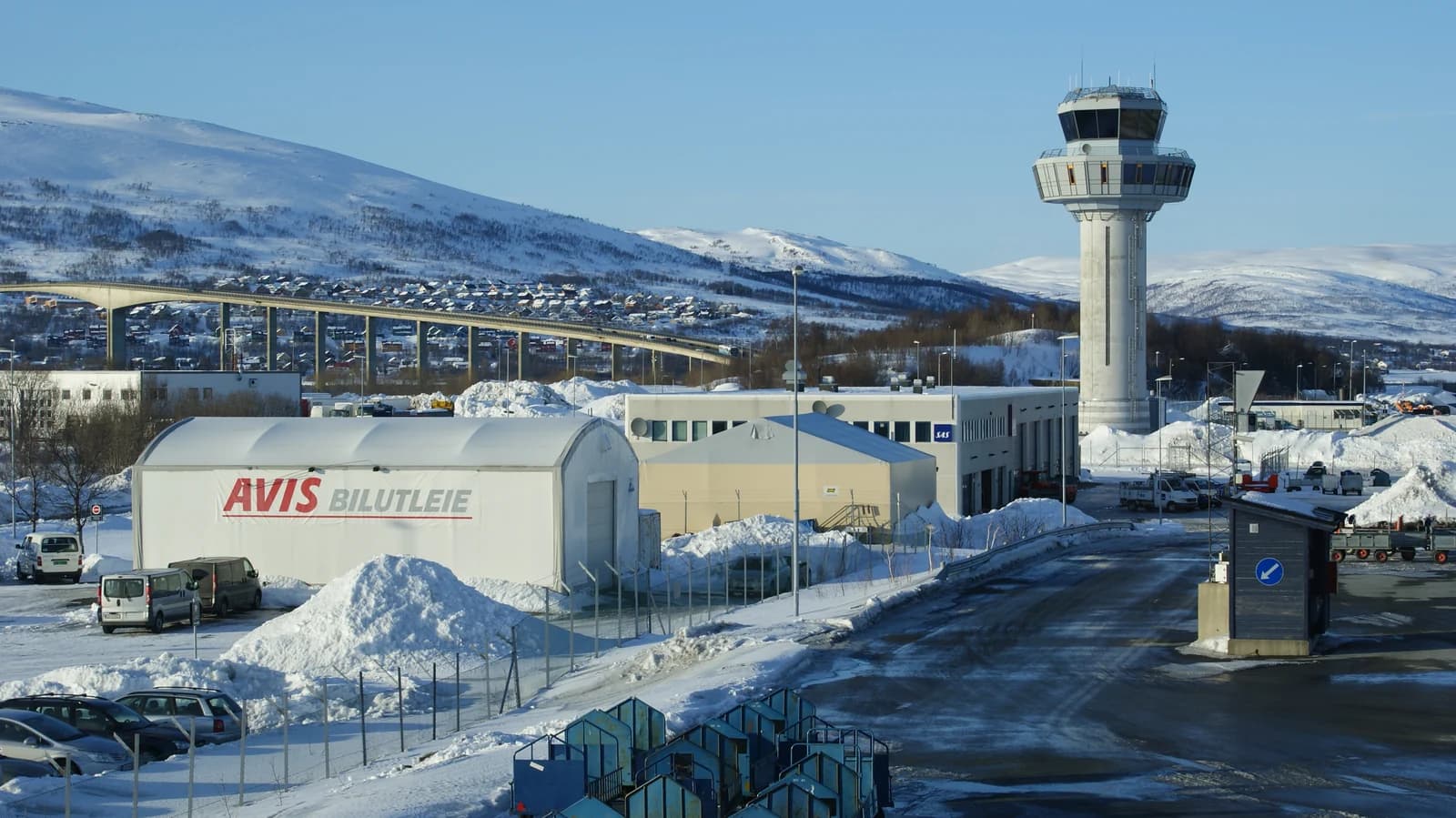 The control tower and snowy apron at Tromso airport on the Langnes side of the island