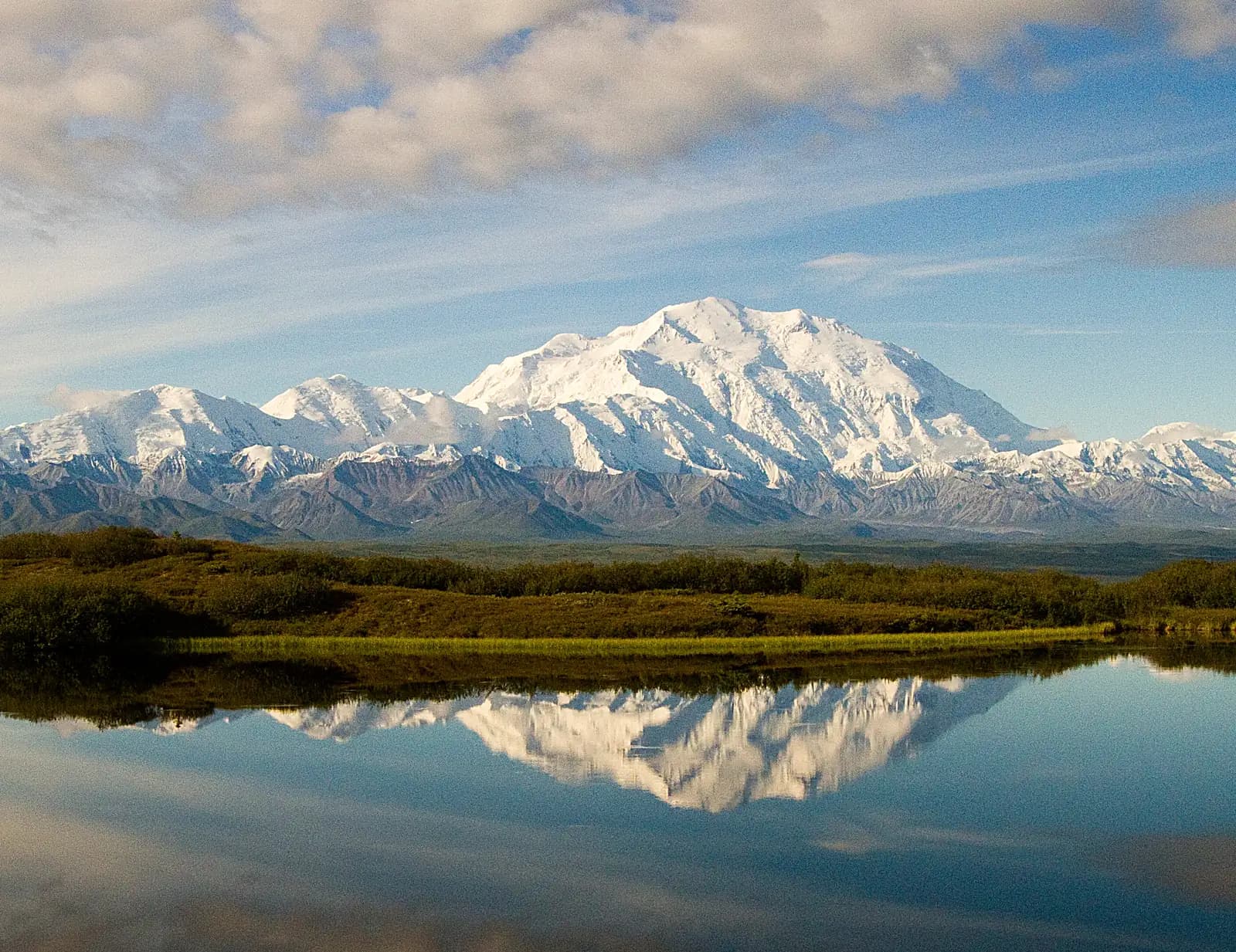 Denali reflected in the calm waters of Wonder Lake, Denali National Park, Alaska