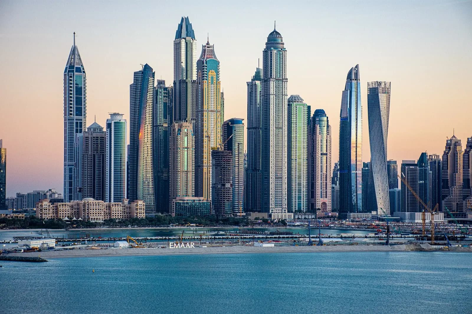 The high-rise skyline of Dubai Marina reflected in the water