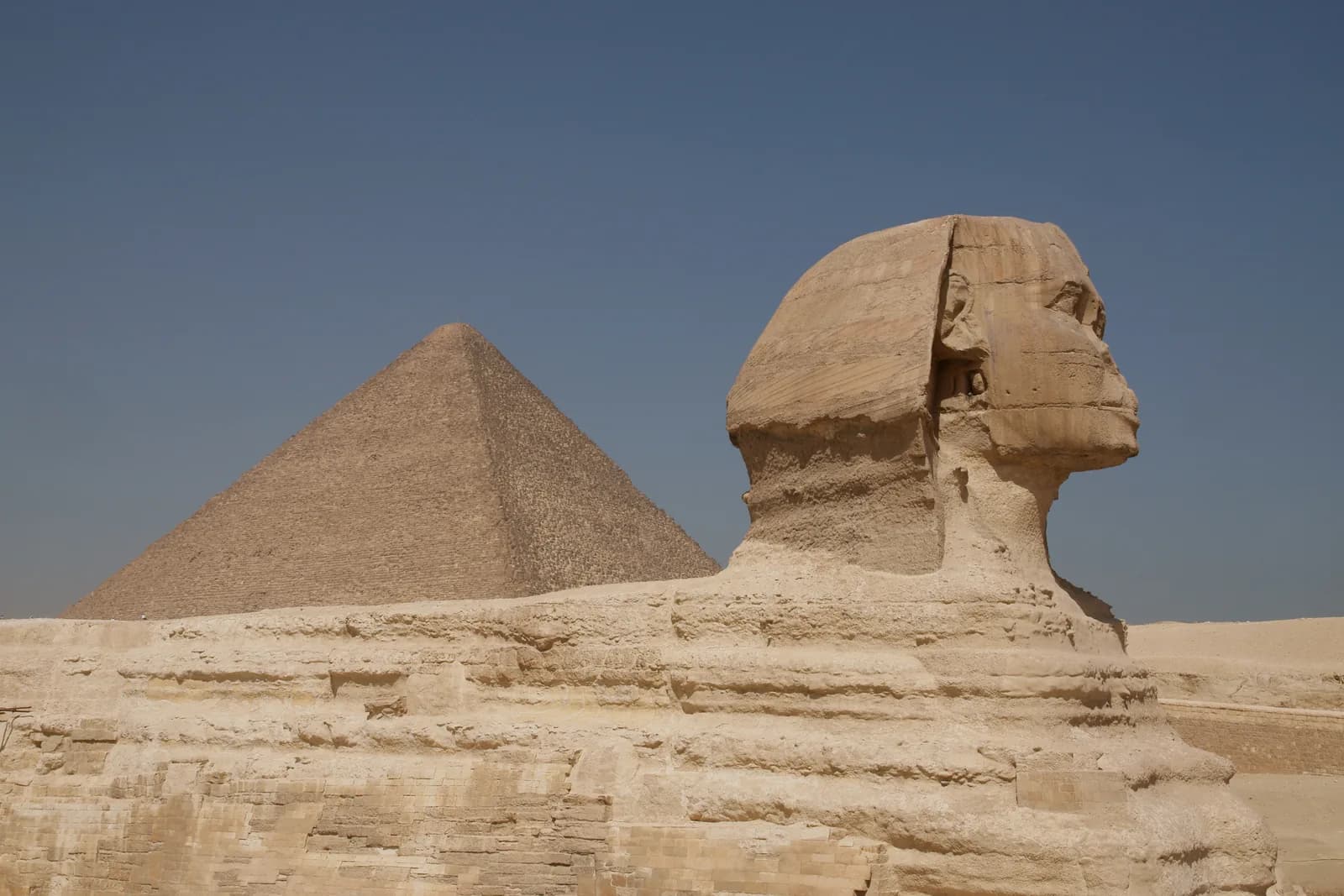 The Great Sphinx with the Pyramid of Cheops behind, Giza, Egypt