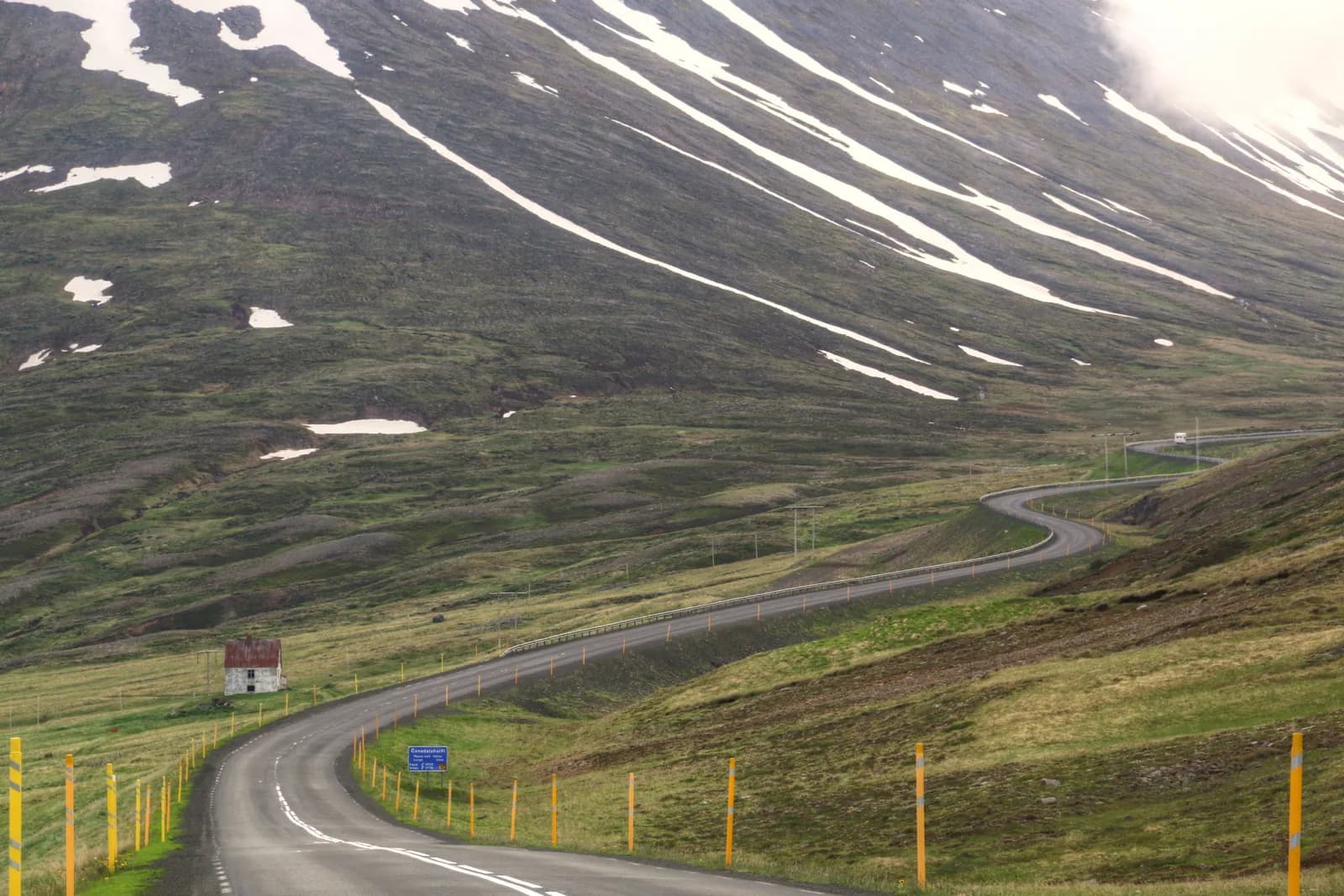 The Ring Road winding through Iceland's green mountains