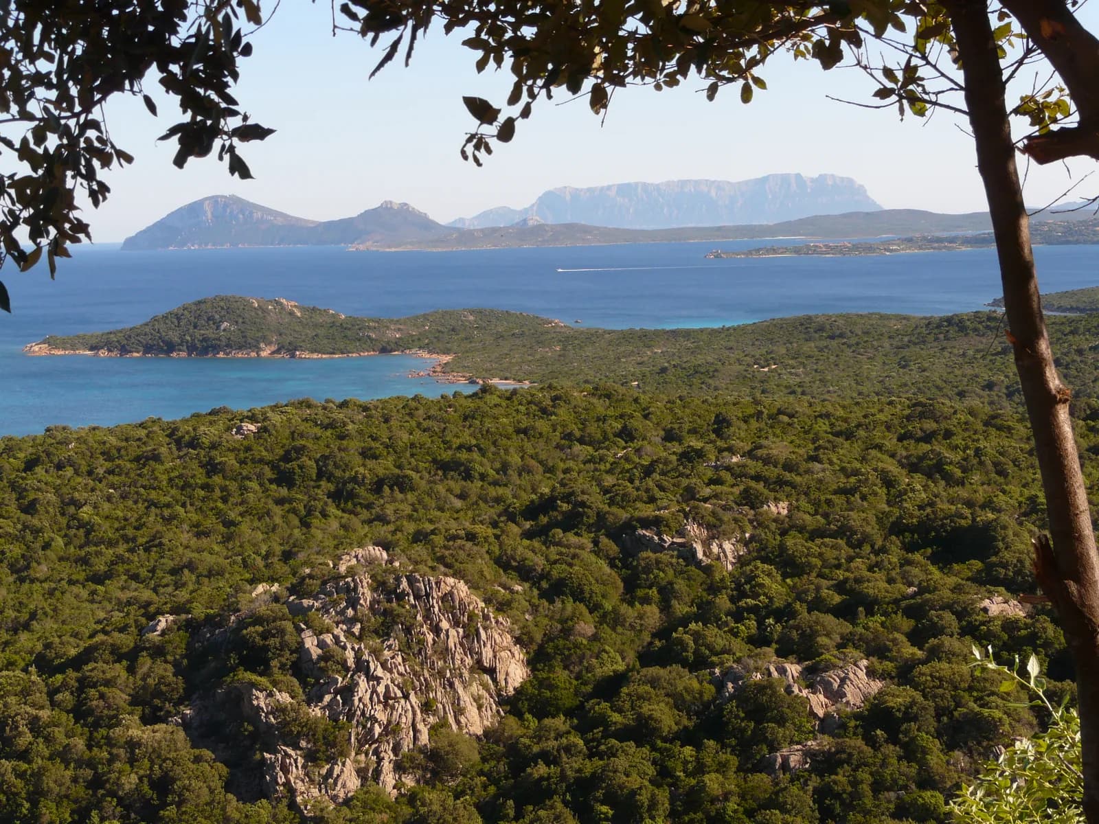 Granite rocks and clear turquoise water on the Costa Smeralda coastline in northeast Sardinia