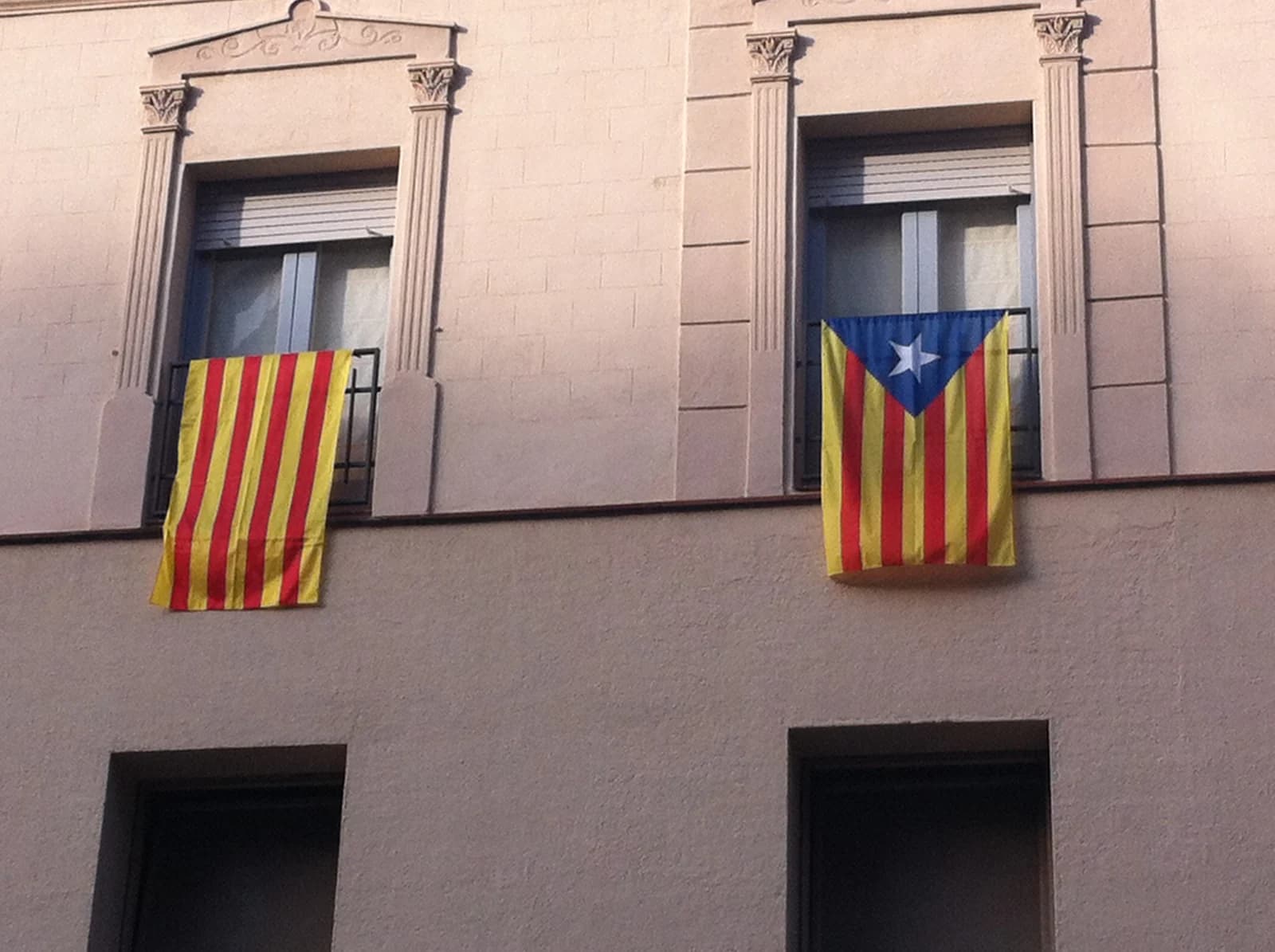 Pavement tables and street trees on Carrer d'Enric Granados in Barcelona