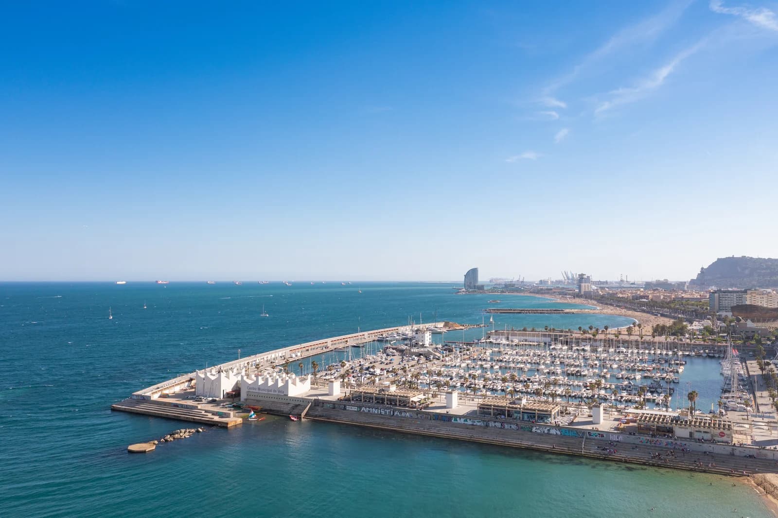 Yachts moored in the marina at Port Olimpic in Barcelona seen from the air