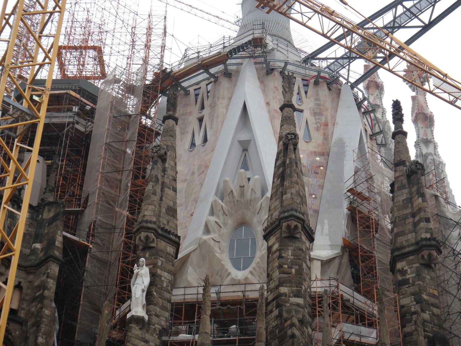 The towers of the Sagrada Familia rising above the streets of the Eixample