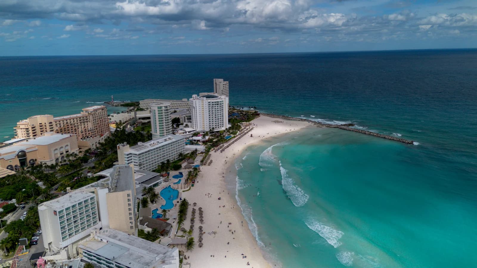 The beach and breakwater around Playa Gaviota Azul at Punta Cancun seen from the air