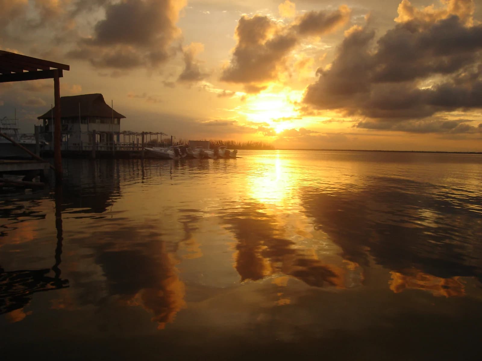 Sunset over the Nichupte Lagoon from a boat dock in Cancun's Hotel Zone