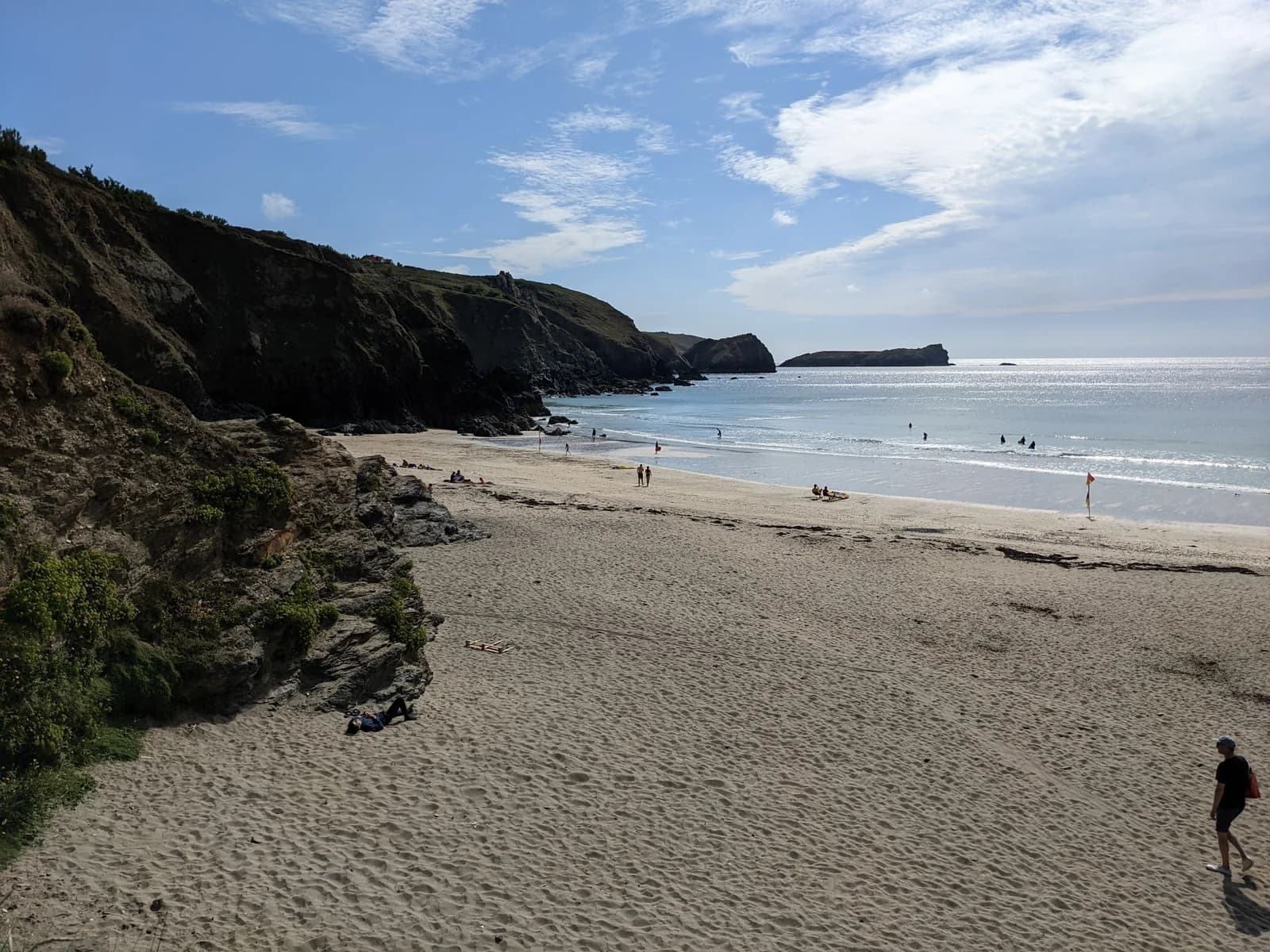 Lifeguard flags on the sand at Polurrian Cove near Mullion on the Lizard