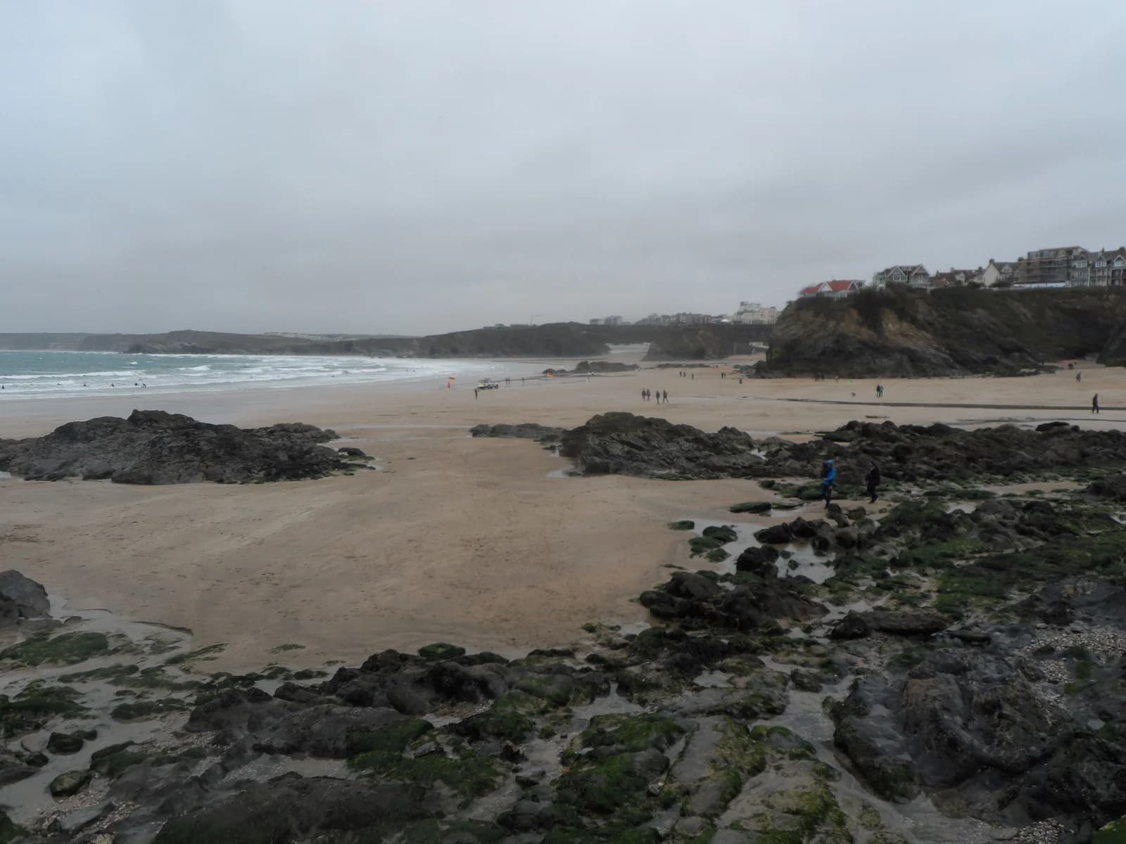 Rock pools and sand at Towan Beach below the centre of Newquay