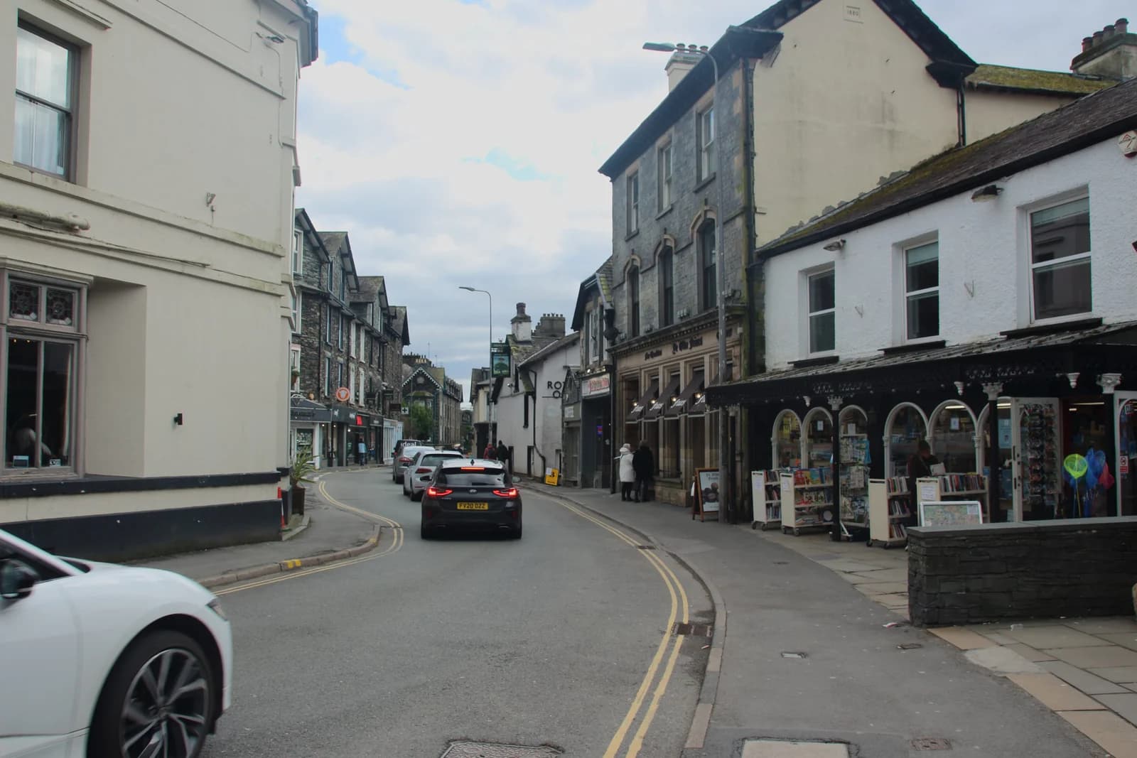 Shops and stone buildings on Market Place in the centre of Ambleside