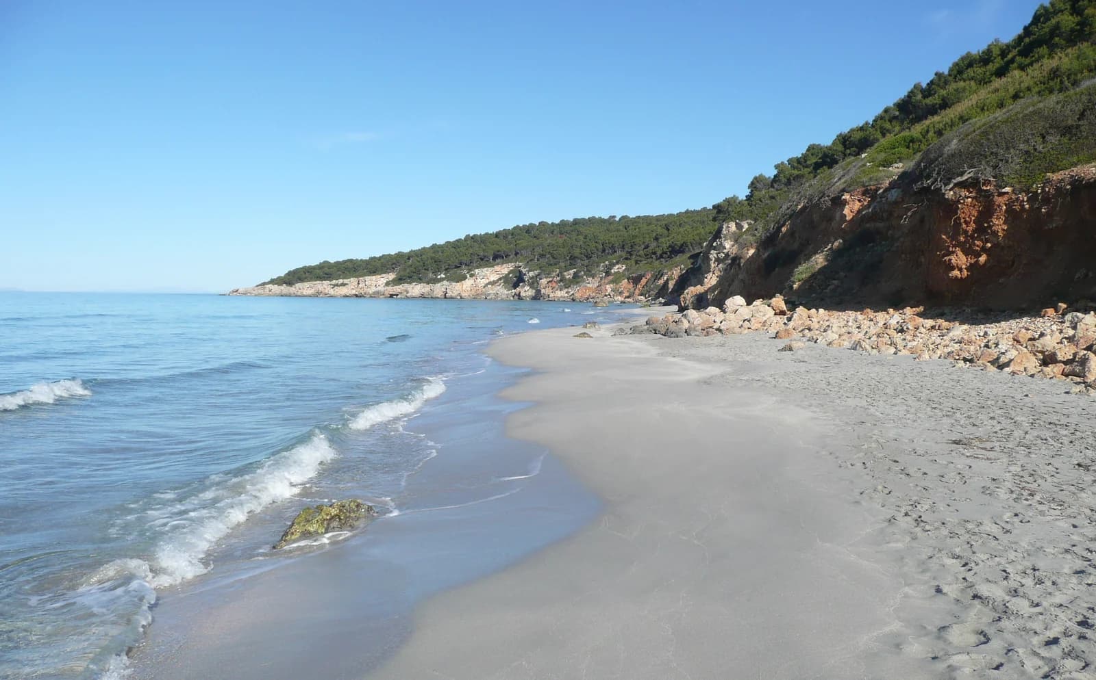 Binigaus beach, the sandy stretch just west of Sant Tomas on the south coast